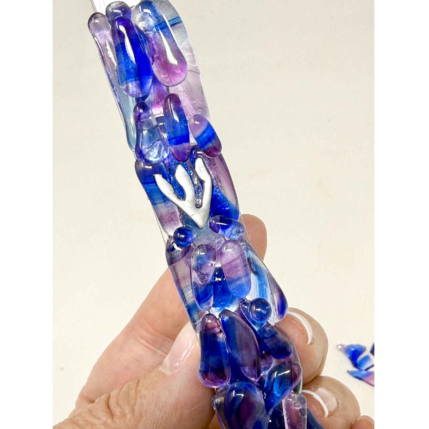 Upright Pebbles Wedding Glass Mezuzah Close up - Petroff Gallery
