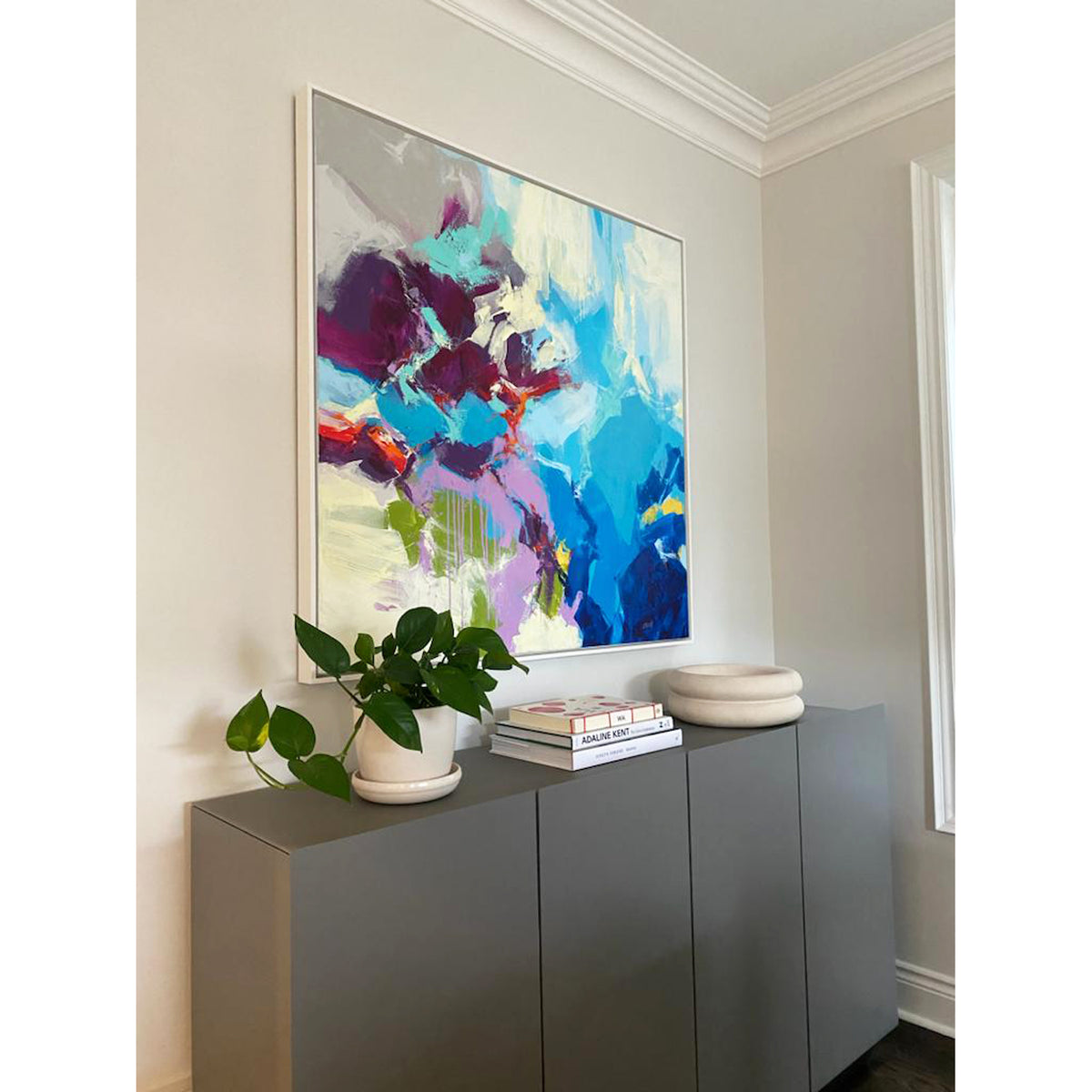 Cobie Cruz Painting Over Sideboard - Petroff Gallery Client Project